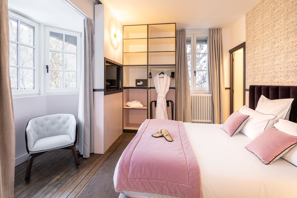 Imagen de la habitación del Hotel Les Jardins de Coppelia. Foto 17