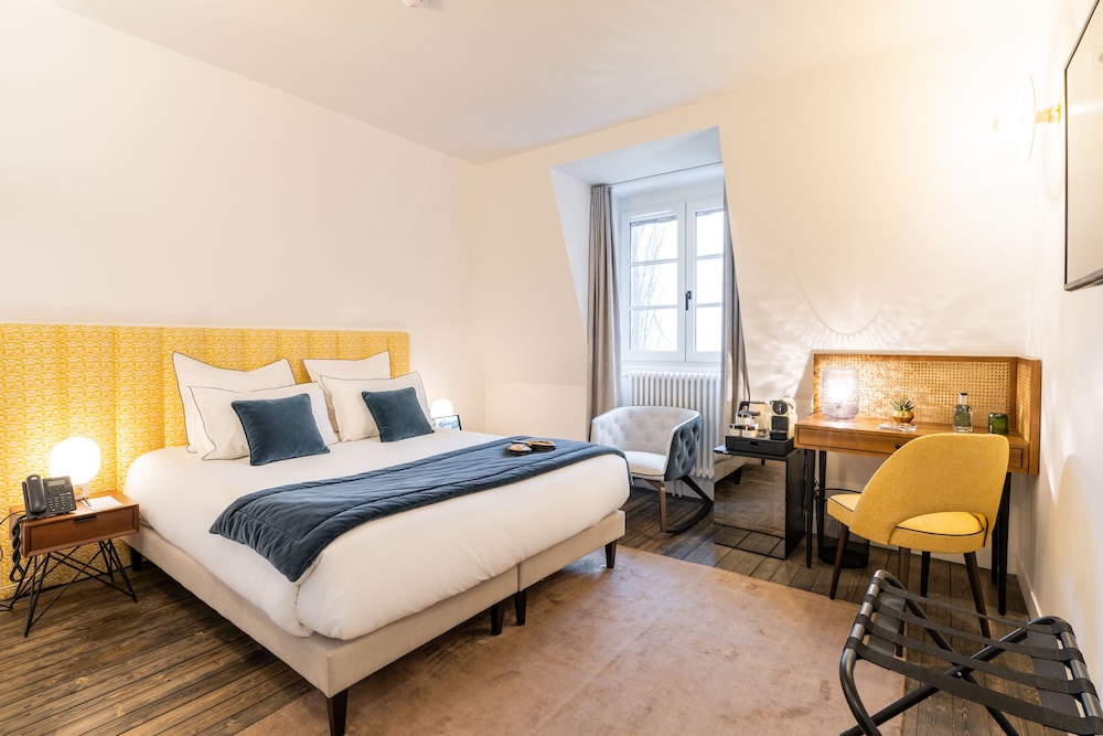 Imagen de la habitación del Hotel Les Jardins de Coppelia. Foto 19