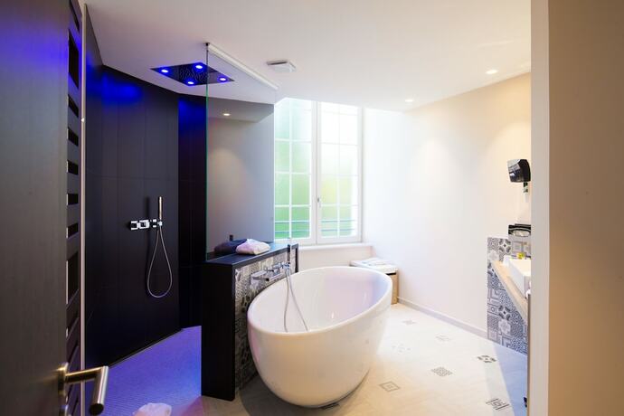 Imagen de la habitación del Hotel Les Jardins du Mess. Foto 15