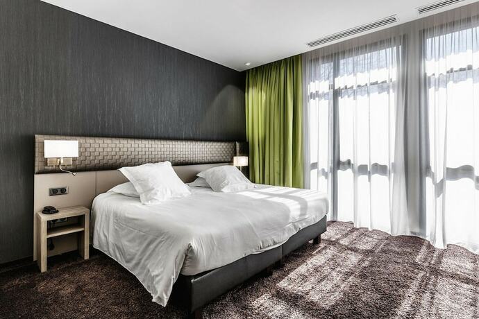 Imagen general del Hotel Les Jardins du Mess. Foto 7