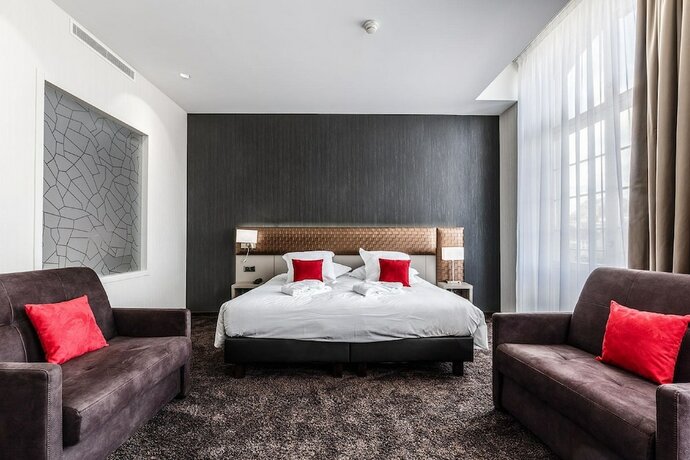 Imagen de la habitación del Hotel Les Jardins du Mess. Foto 20