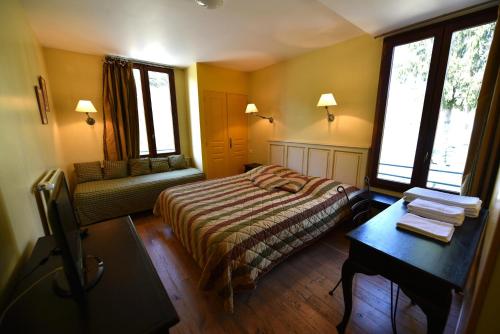 Imagen de la habitación del Hotel Les Lodges Du Lac. Foto 7