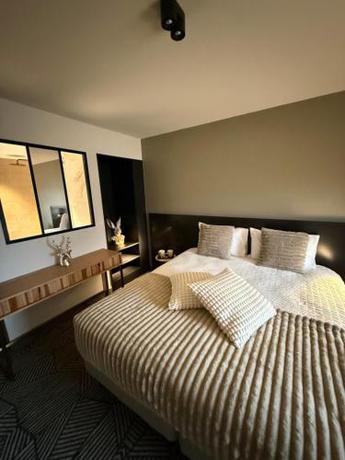 Imagen de la habitación del Hotel Les Lodges de Socrate. Foto 3