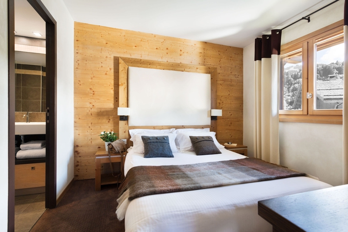 Imagen de la habitación del Hotel Les Loges Blanches. Foto 7