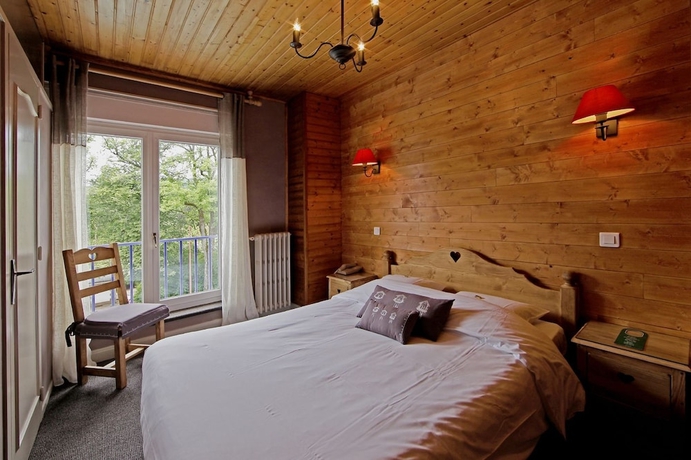 Imagen de la habitación del Hotel Les Loges Du Parc. Foto 6