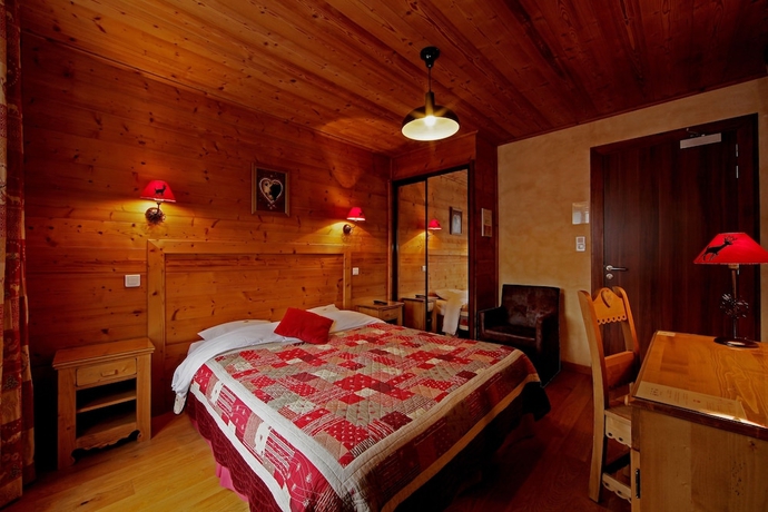 Imagen de la habitación del Hotel Les Loges Du Parc. Foto 11