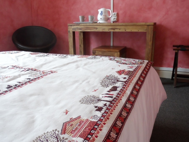 Imagen de la habitación del Hotel Les Loges Du Parc. Foto 13