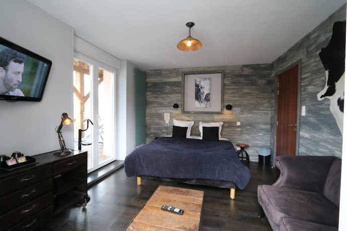 Imagen de la habitación del Hotel Les Loges Du Parc. Foto 15