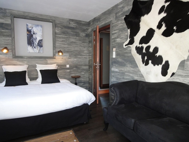 Imagen de la habitación del Hotel Les Loges Du Parc. Foto 16