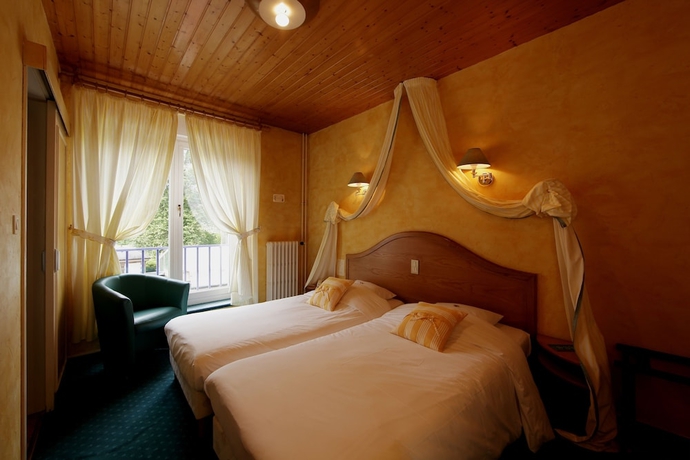 Imagen de la habitación del Hotel Les Loges Du Parc. Foto 17