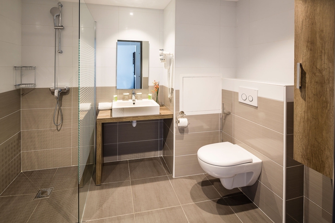 Imagen de la habitación del Hotel Les Loges Du Park – Résidence ière. Foto 11