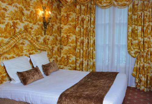 Imagen de la habitación del Hotel Les Lumi&egrave;res. Foto 5