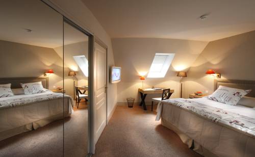 Imagen de la habitación del Hotel Les Manoirs De Tourgéville. Foto 4