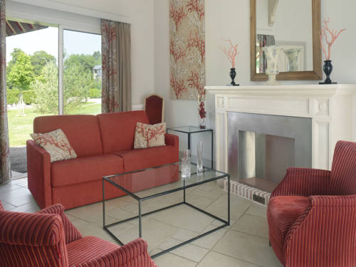 Imagen de la habitación del Hotel Les Manoirs De Tourgéville. Foto 11