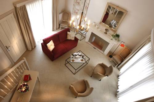 Imagen de la habitación del Hotel Les Manoirs De Tourgéville. Foto 15