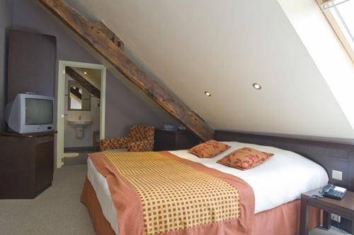 Imagen de la habitación del Hotel Les Mignees. Foto 3