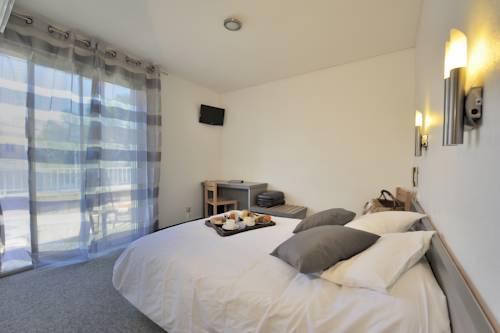 Imagen de la habitación del Hotel Les Mimosas. Foto 8