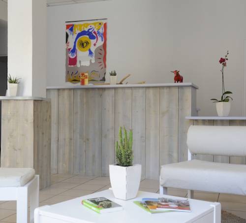 Imagen de la habitación del Hotel Les Mimosas. Foto 11