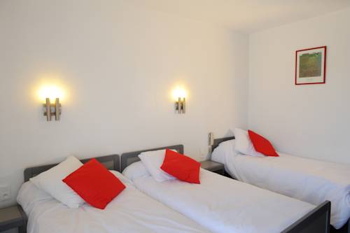 Imagen de la habitación del Hotel Les Mimosas. Foto 15