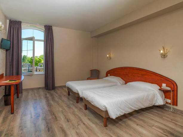 Imagen de la habitación del Hotel Les Minotiers. Foto 13