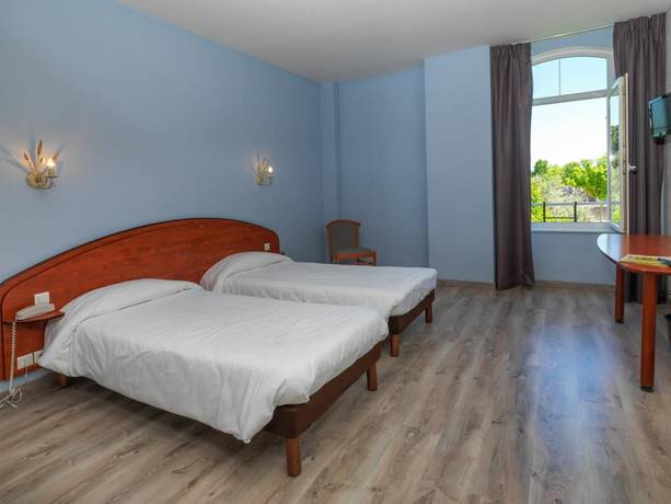 Imagen de la habitación del Hotel Les Minotiers. Foto 15