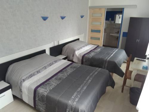 Imagen de la habitación del Hotel Les Montois. Foto 10