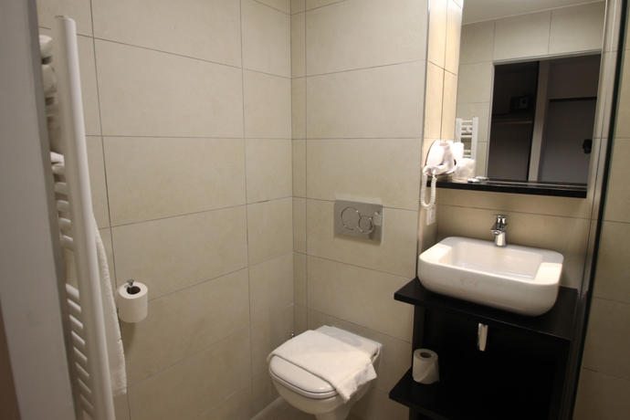 Imagen de la habitación del Hotel Les Muses. Foto 7