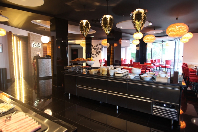 Imagen del bar/restaurante del Hotel Les Muses. Foto 2