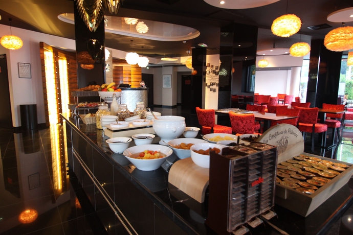 Imagen del bar/restaurante del Hotel Les Muses. Foto 3