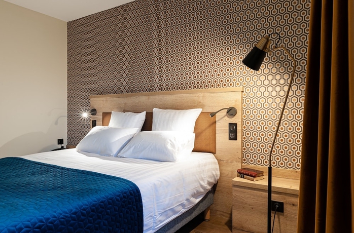 Imagen de la habitación del Hotel Les Nomades. Foto 9