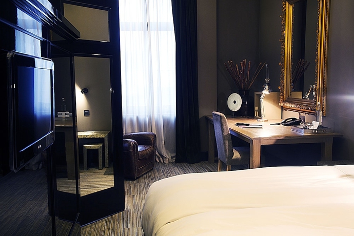 Imagen de la habitación del Hotel Les Nuits. Foto 7