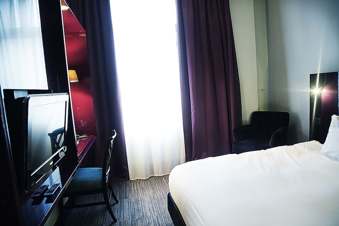 Imagen de la habitación del Hotel Les Nuits. Foto 11