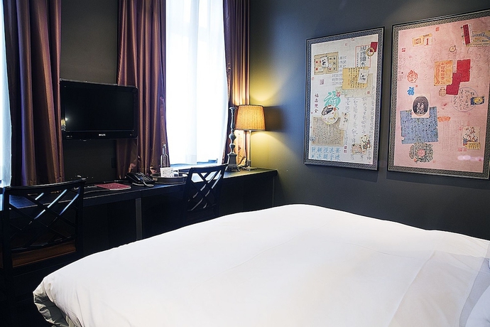 Imagen de la habitación del Hotel Les Nuits. Foto 15