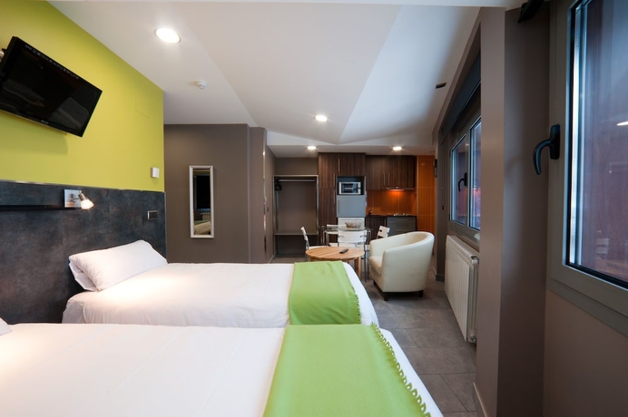 Imagen de la habitación del Hotel Les Olimpiades. Foto 13