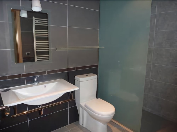 Imagen de la habitación del Hotel Les Olimpiades. Foto 15