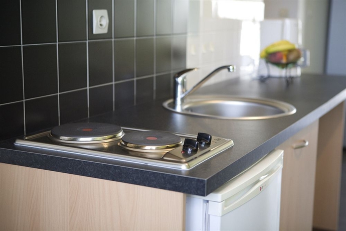 Imagen de la habitación del Hotel Les Palatines - Residence. Foto 11