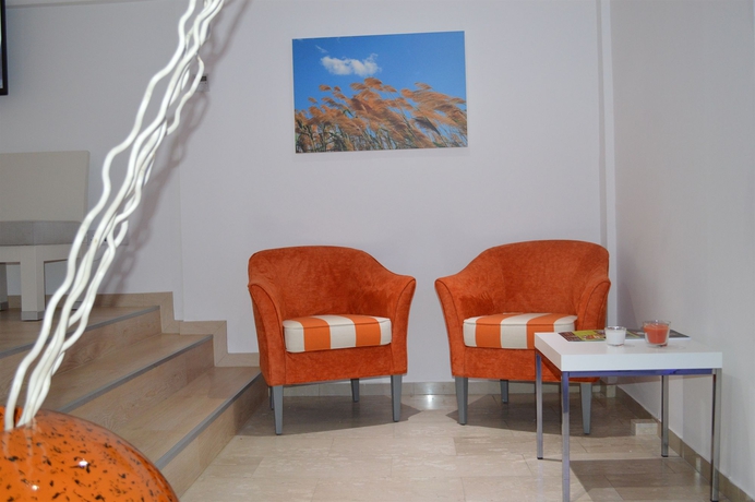 Imagen de los interiores del Hotel Les Palmiers Beach Boutique & Luxury Apartments. Foto 10