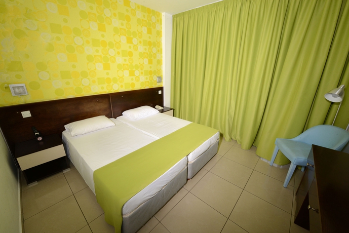 Imagen de la habitación del Hotel Les Palmiers Beach Boutique & Luxury Apartments. Foto 7