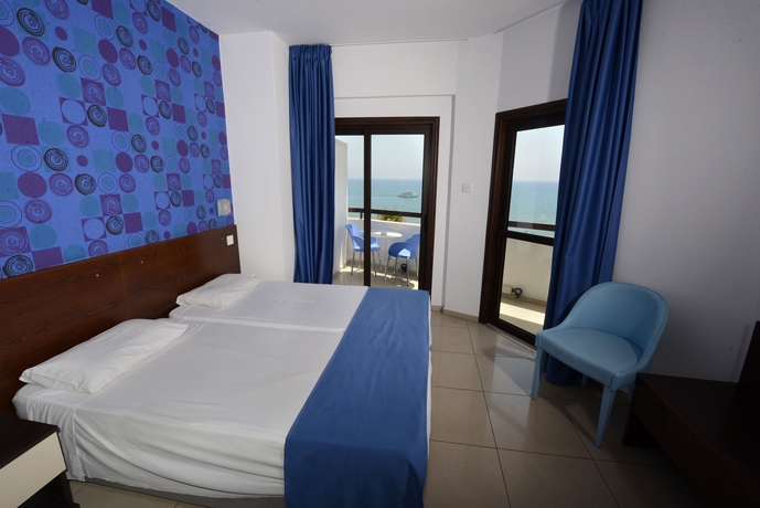Imagen de la habitación del Hotel Les Palmiers Beach Boutique & Luxury Apartments. Foto 9