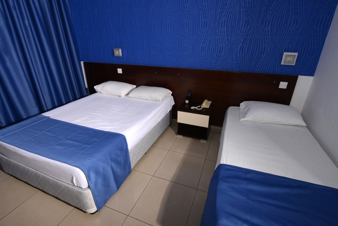 Imagen de la habitación del Hotel Les Palmiers Beach. Foto 8