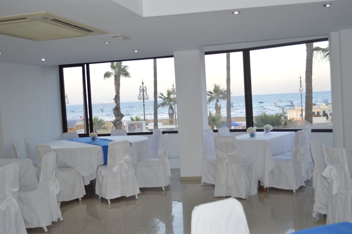 Imagen del bar/restaurante del Hotel Les Palmiers Beach. Foto 5