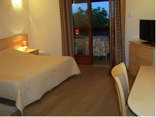 Imagen de la habitación del Hotel Les Pavillons du Golf. Foto 3