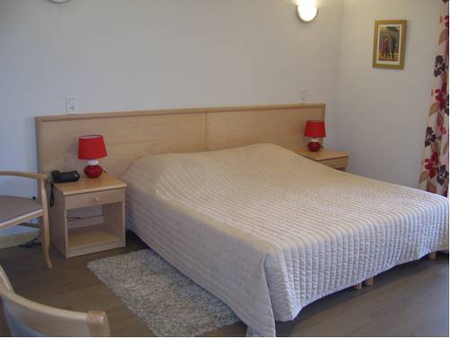 Imagen de la habitación del Hotel Les Pavillons du Golf. Foto 4