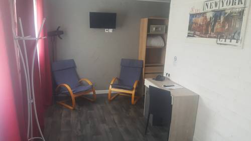 Imagen de la habitación del Hotel Les Pelouses. Foto 12