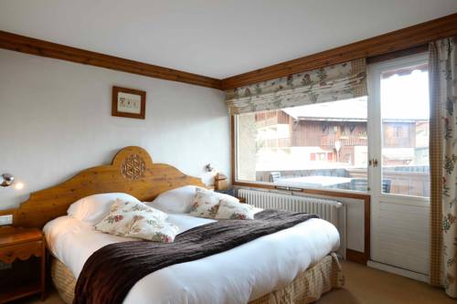 Imagen de la habitación del Hotel Les Peupliers. Foto 16