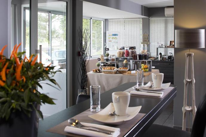 Imagen general del Hotel Les Pierres Dorées. Foto 6