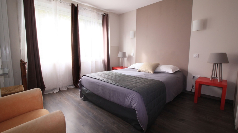 Imagen de la habitación del Hotel Les Pieux. Foto 2