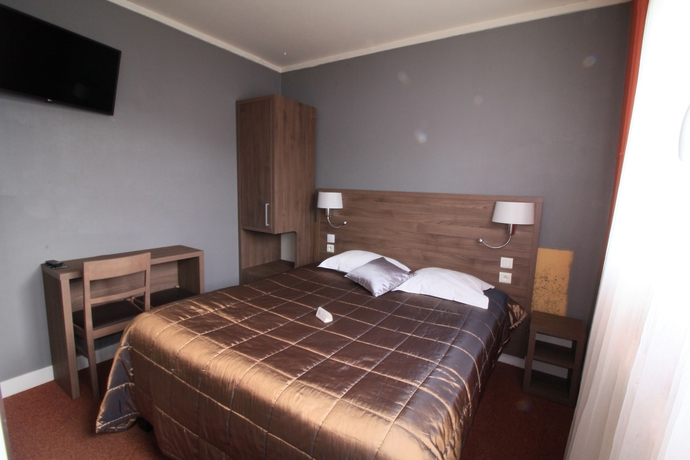 Imagen de la habitación del Hotel Les Pieux. Foto 13