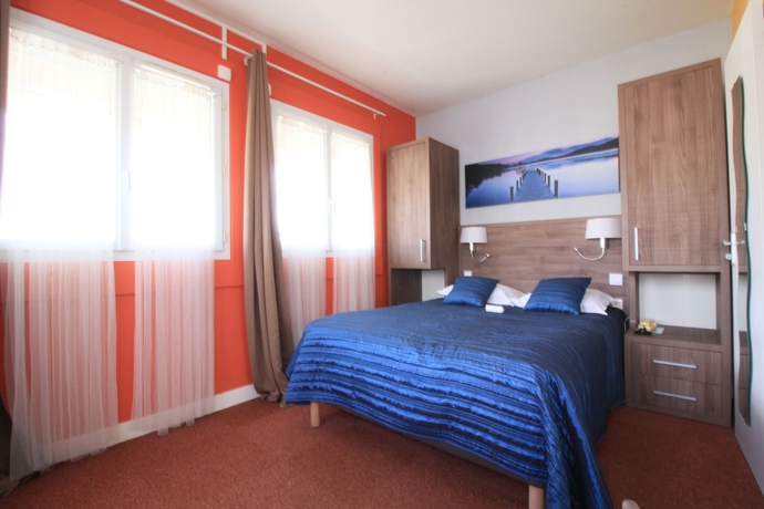Imagen de la habitación del Hotel Les Pieux. Foto 16