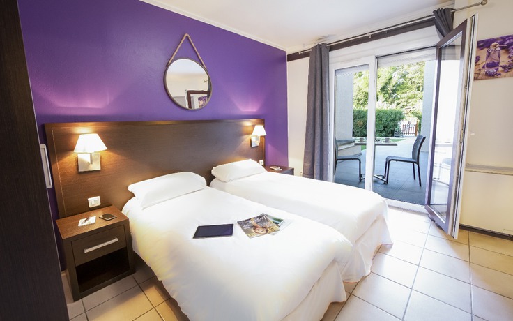 Imagen de la habitación del Hotel Les Pins Blancs En Provence. Foto 17